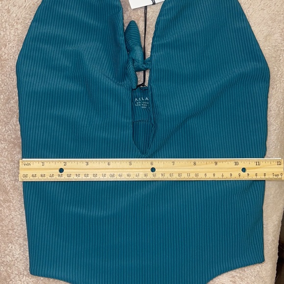Aila one piece swimsuit size small. Its new but tried on. - Picture 3 of 7